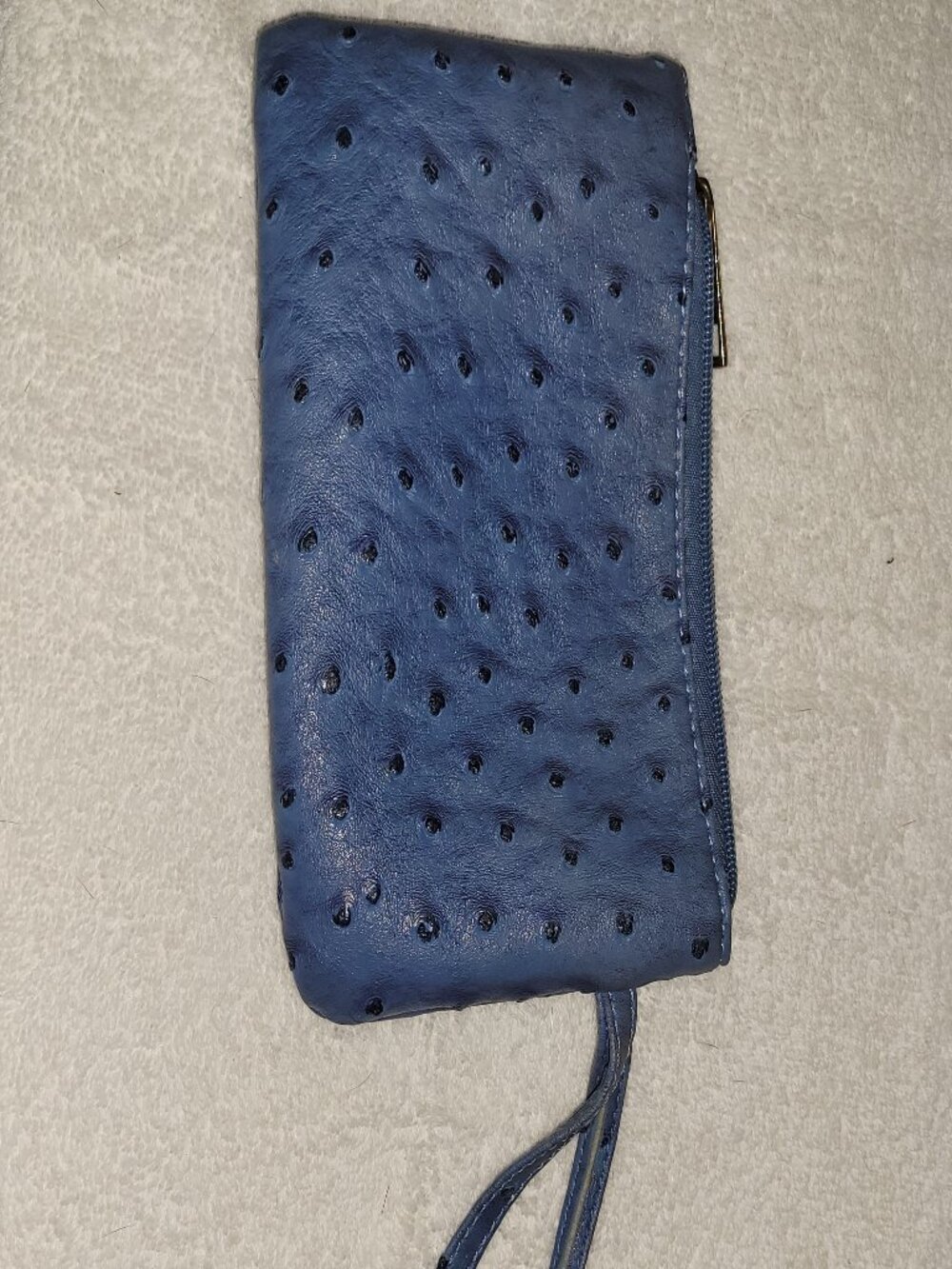 Faux ostrich leather handbag or makeup bag blue